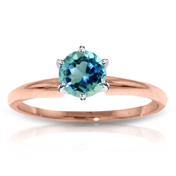SOLID GOLD SOLITAIRE RING WITH NATURAL BLUE TOPAZ